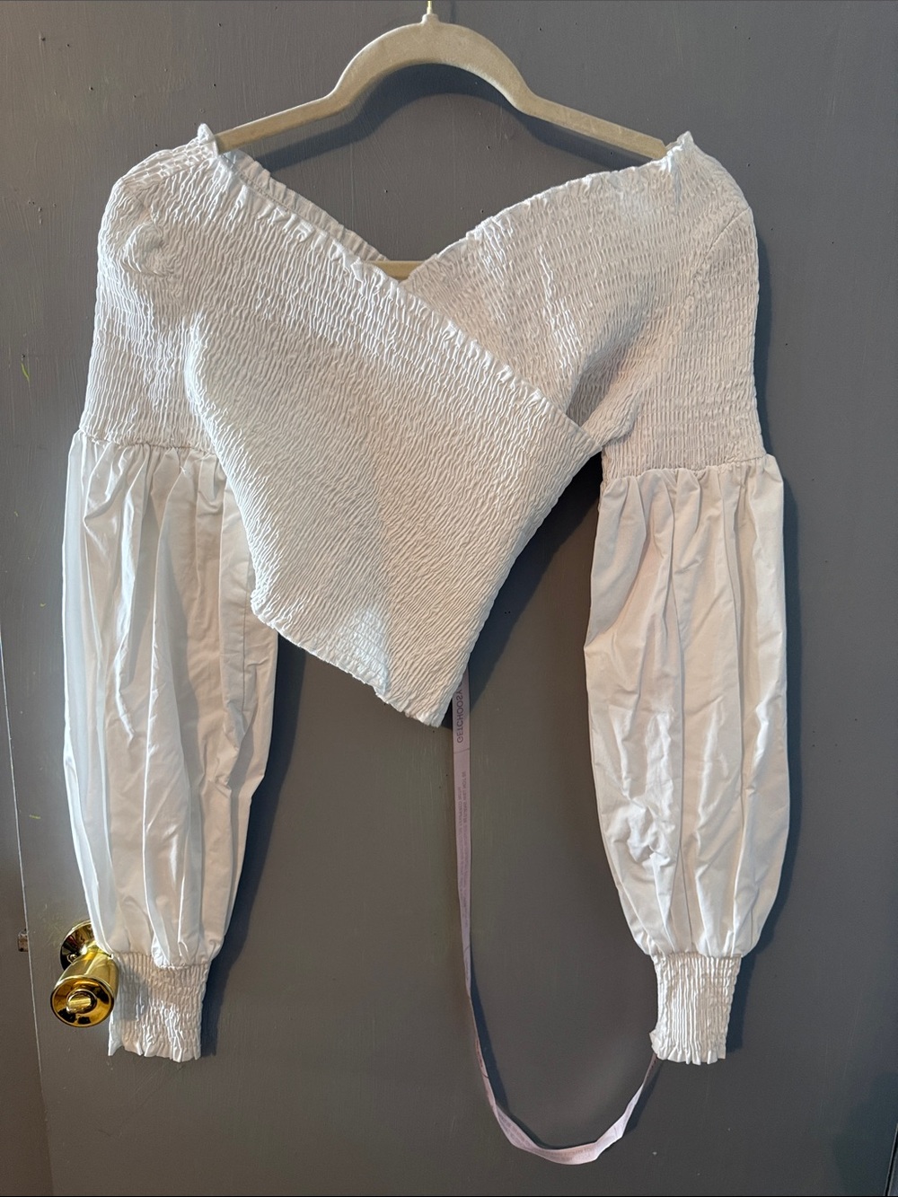 Smocked White Wrap Blouse with Balloon Sleeves